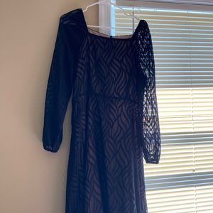 long, lightweight black dress. square neckline. never worn